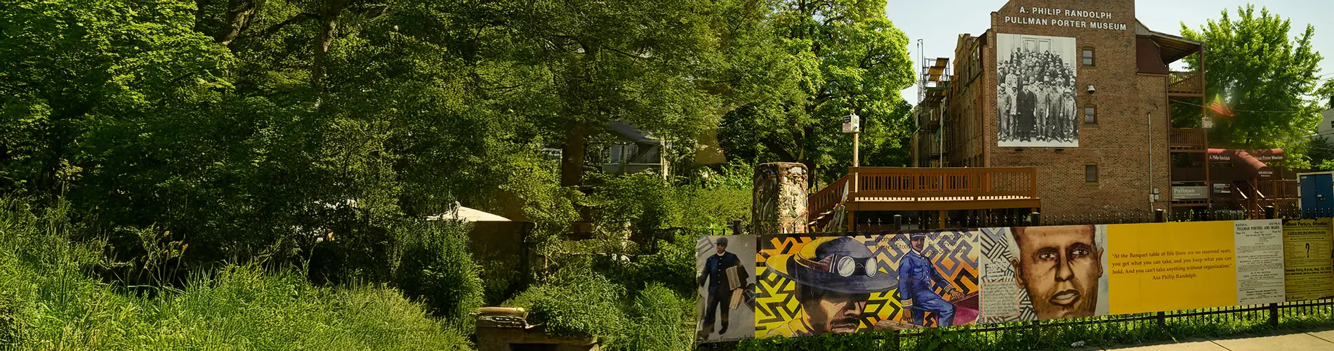 Exterior photograph of the A. Philip Randolph Pullman Porter Museum brick building with murals