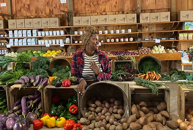 FarmerJawn owner Christa Barfield photographed with produce