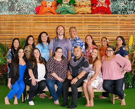 Members of the team at Hawaii Community Lending pose for a photo.