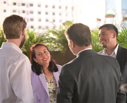 4 OFN Conference attendees conversing