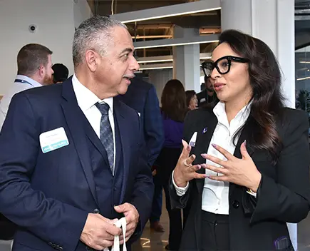 Two OFN conference attendees conversing