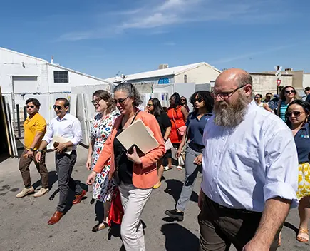 Group of Career Meets Purpose representatives walking through a lot